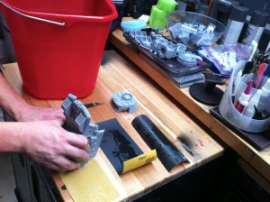 Web sanding the flat edges of a Reaver Titan Wet sanding the flat edges of a Reaver Titan