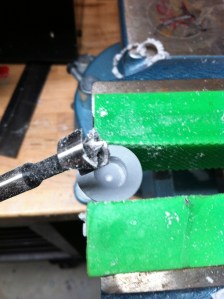 Reaver arm top being drilled with forstner bit