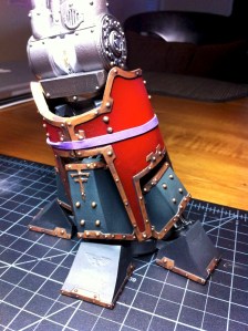 Reaver Titan lower leg armor plates being glued